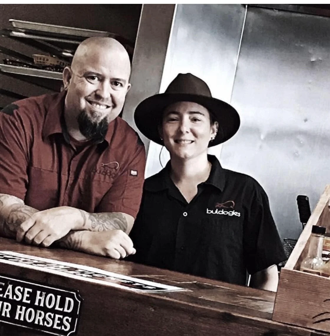 Breian and Jamie, the Buldogies founders, behind the restaurant counter